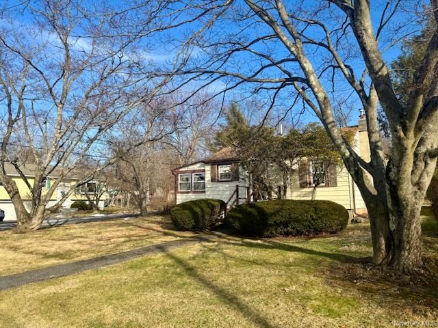 46 Salem Road Carmel, NY 10512 - Photo 14 of 21 a front view of a house with a yard and tree