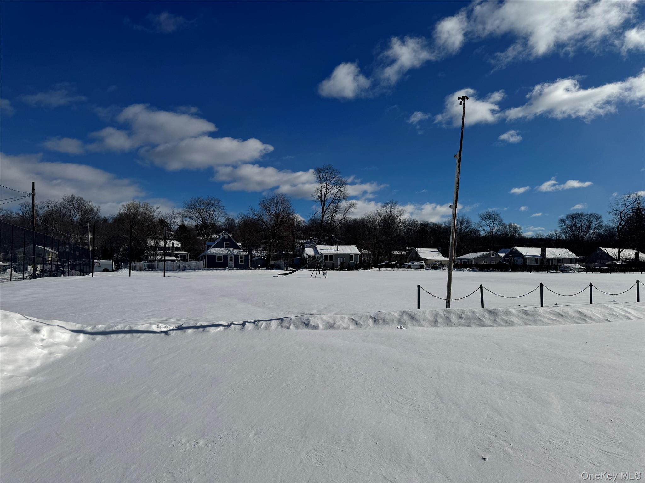 46 Salem Road Carmel, NY 10512 - Photo 20 of 21 a view of a yard with a snow on the road