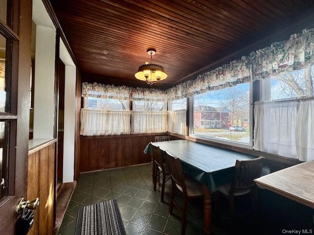 46 Salem Road Carmel, NY 10512 - Photo 4 of 21 a kitchen with a table chairs and wooden floor