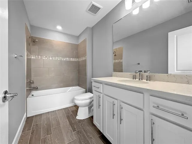 a view of room and wooden floor