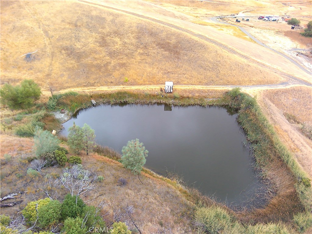 8740 Rocky Creek Road Lower Lake, CA 95457 - Photo 13 of 38 a view of a lake with beach