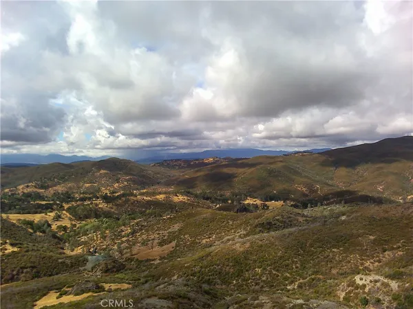 a view of a lake with mountains in the background