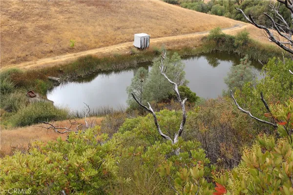 a view of an ocean and a mountain