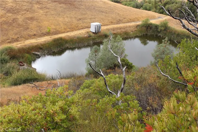a view of an ocean and a mountain