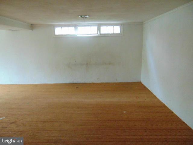7127 Boxford Road Baltimore, MD 21215 - Photo 8 of 14 a view of room and window
