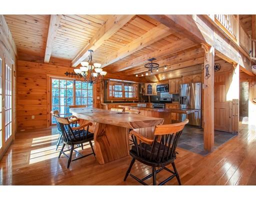 326 NW Road Westhampton, MA 01027 - Photo 14 of 42 a dining room with furniture and wooden floor