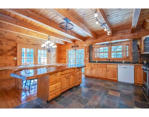 326 NW Road Westhampton, MA 01027 - Photo 18 of 42 a large kitchen with granite countertop a stove a sink and a refrigerator
