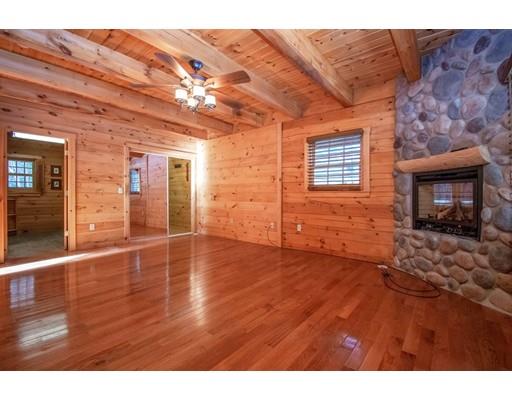 326 NW Road Westhampton, MA 01027 - Photo 22 of 42 a view of an empty room with wooden floor and a window