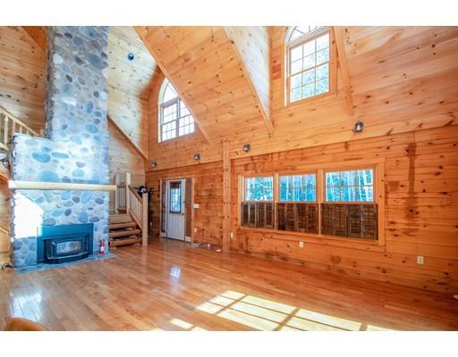 326 NW Road Westhampton, MA 01027 - Photo 10 of 42 a view of a brick house with many windows