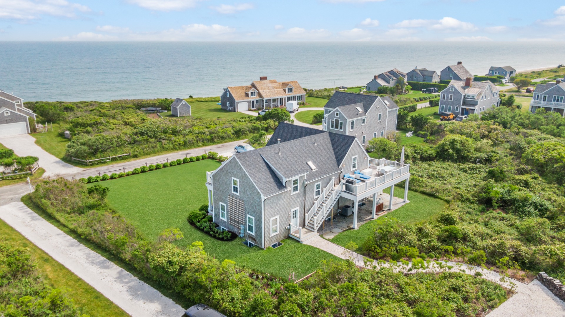 30 Wanoma Way Nantucket, MA 02554 - Photo 54 of 57 a view of a house with a big yard and large trees