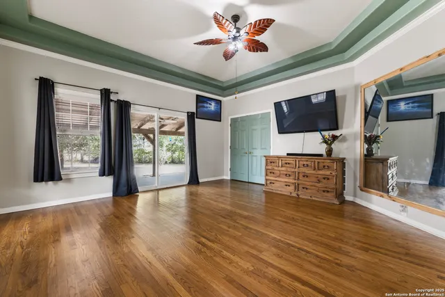 a view of an entryway with wooden floor