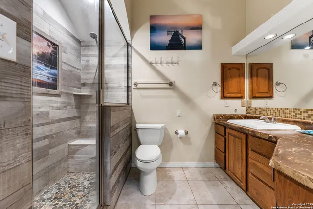a kitchen with a sink and a stove top oven