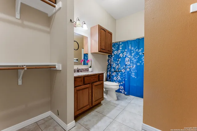 a kitchen with stainless steel appliances granite countertop a sink and a granite counter tops