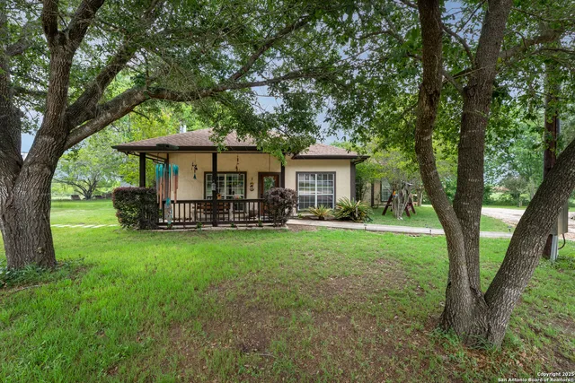 a view of house with a outdoor space