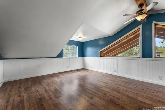 a view of an empty room with storage