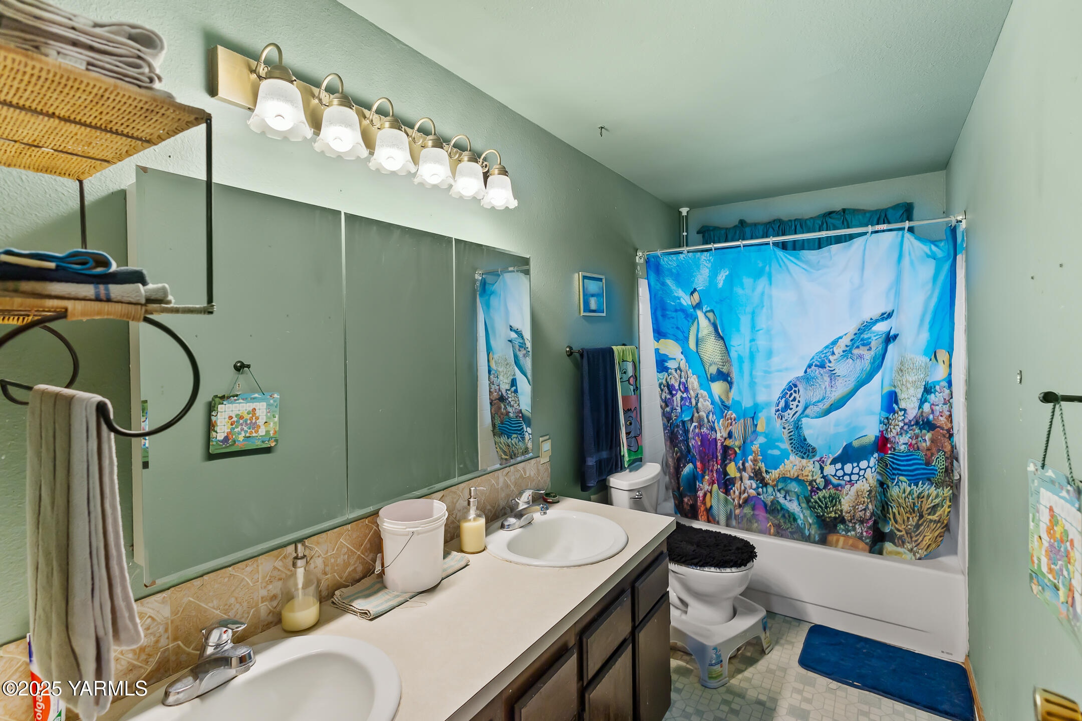 171 West Taylor Road Selah, WA 98942 - Photo 26 of 37 a bathroom with a sink mirror and a shower