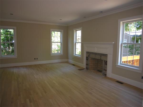 73 Berkshire Road Needham, MA 02492 - Photo 14 of 28 an empty room with windows and fireplace