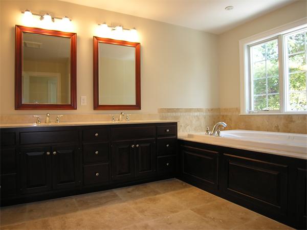 73 Berkshire Road Needham, MA 02492 - Photo 17 of 28 a bathroom with a sink vanity and mirror