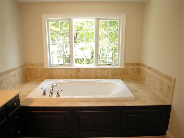 73 Berkshire Road Needham, MA 02492 - Photo 18 of 28 a bathroom with a sink and a bathtub