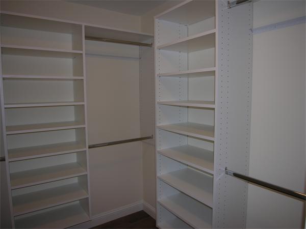73 Berkshire Road Needham, MA 02492 - Photo 19 of 28 a view of walk in closet with empty racks