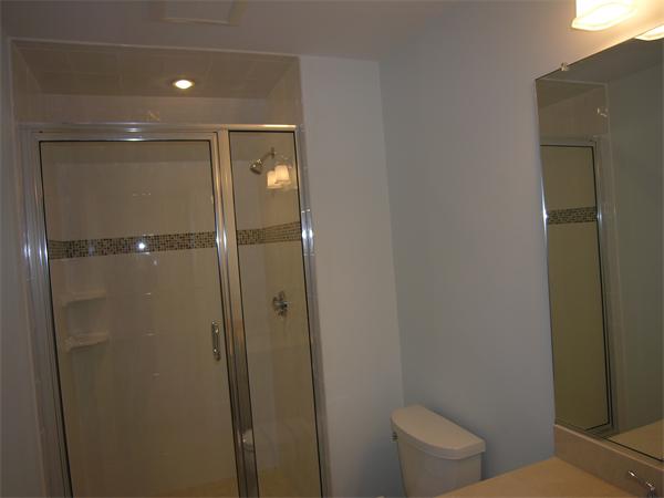 73 Berkshire Road Needham, MA 02492 - Photo 24 of 28 a bathroom with a toilet and a shower
