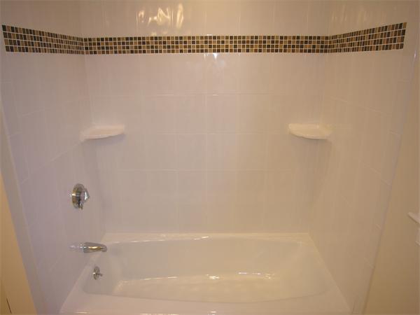 73 Berkshire Road Needham, MA 02492 - Photo 26 of 28 a bathroom with a bathtub
