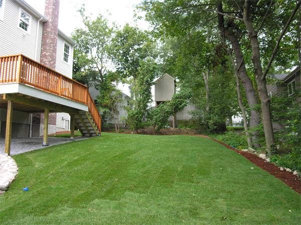 73 Berkshire Road Needham, MA 02492 - Photo 3 of 28 a view of a house with a yard and tree s