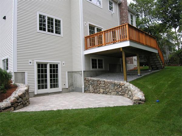 73 Berkshire Road Needham, MA 02492 - Photo 4 of 28 a front view of a house with a garden