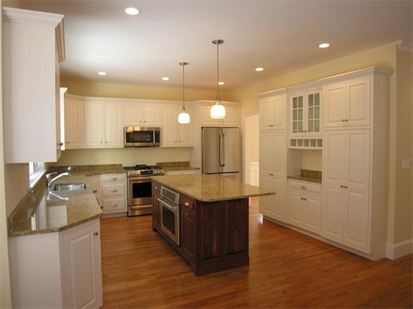 73 Berkshire Road Needham, MA 02492 - Photo 7 of 28 a kitchen with a stove a sink and a refrigerator