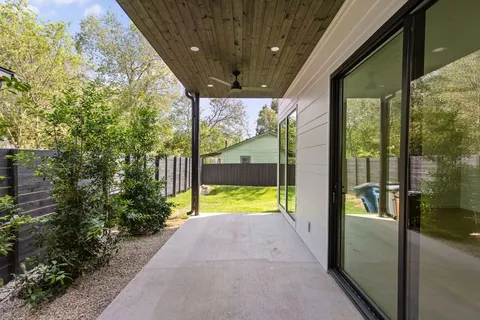 a view of swimming pool with a patio