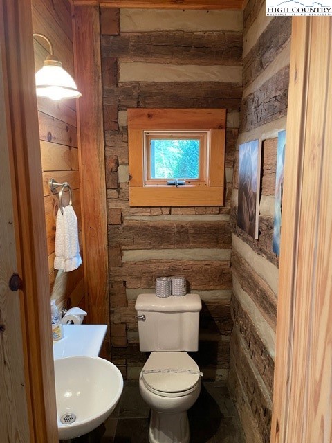 546 Big Sky Road Ferguson, NC 28624 - Photo 12 of 23 a bathroom with a toilet and a sink
