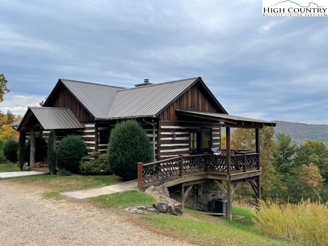 546 Big Sky Road Ferguson, NC 28624 - Photo 2 of 23 a front view of a house with a yard