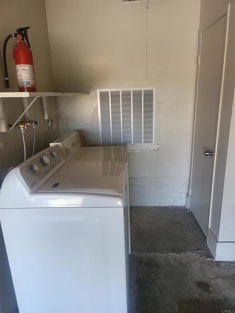 2319 Caringa Way, Unit 56 Carlsbad, CA 92009 - Photo 23 of 24 a utility room with dryer and washer