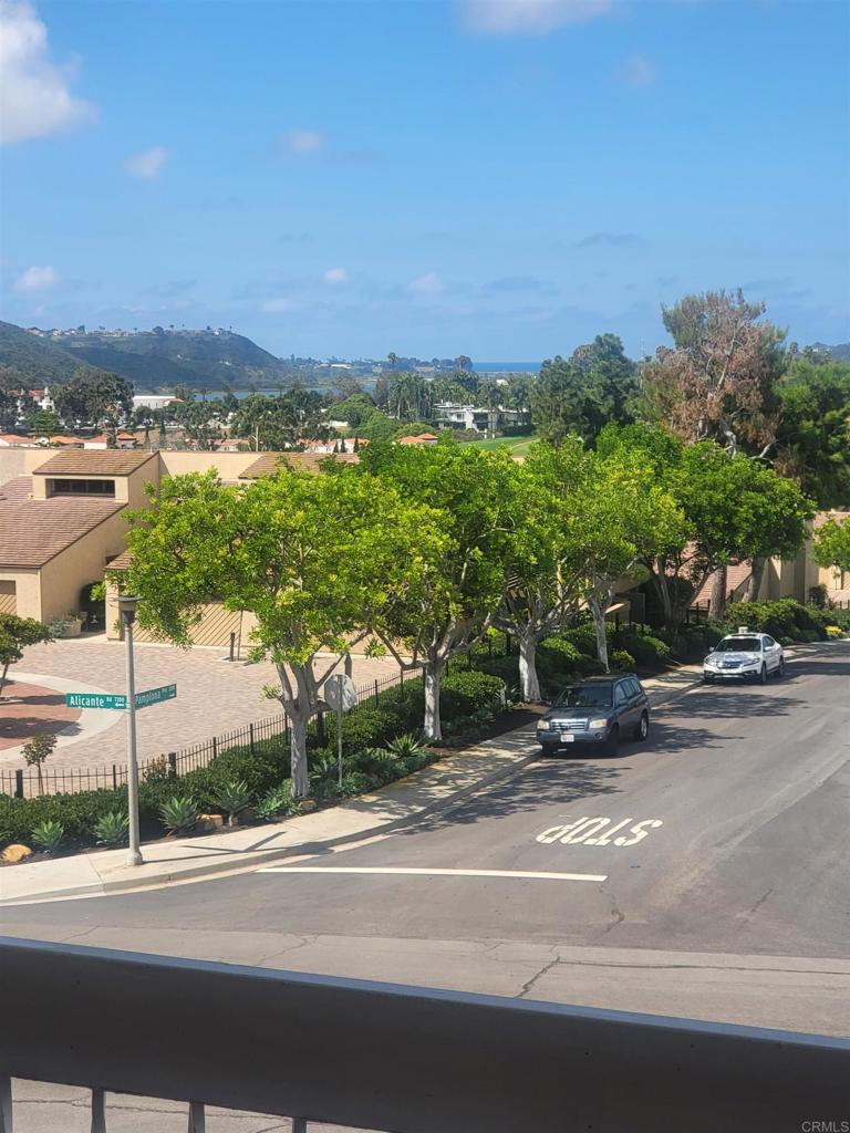 2319 Caringa Way, Unit 56 Carlsbad, CA 92009 - Photo 5 of 24 a view of a city street from a terrace