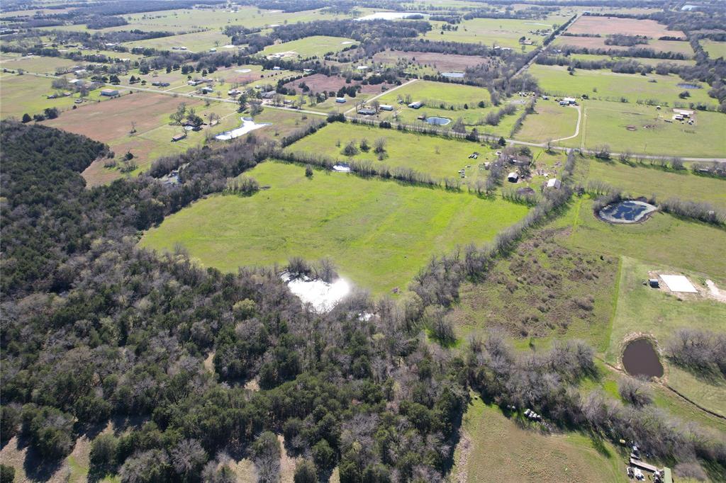 275 S Cumby, TX 75433 - Photo 4 of 27 an aerial view of residential houses with outdoor space