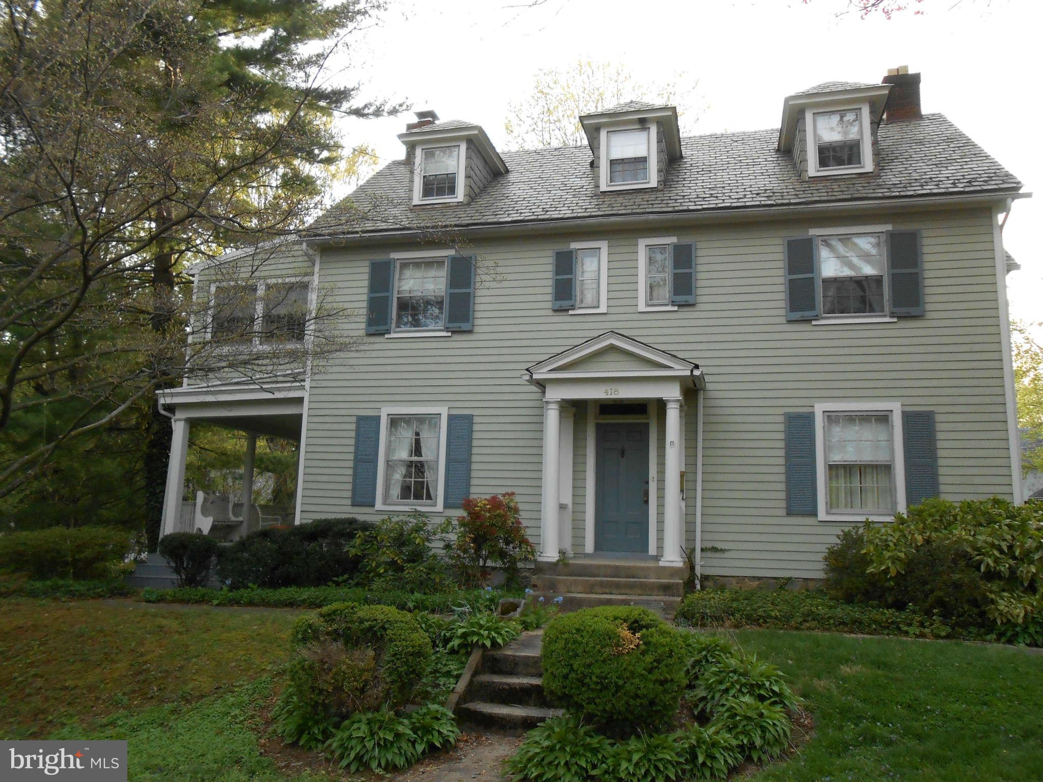 418 Kensington Road Baltimore, MD 21229 - Photo 1 of 1 a front view of a house with garden