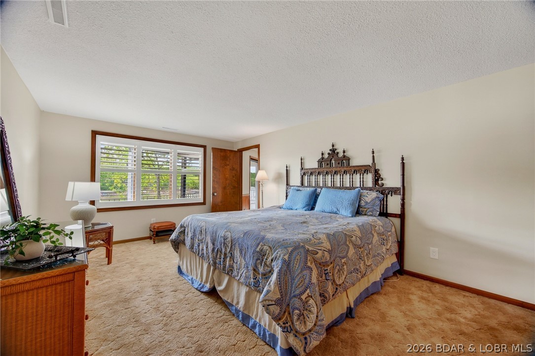 2293 Standing Rock Road Camdenton, MO 65020 - Photo 53 of 99 Lower-Level Lakefront Guest Bedroom.