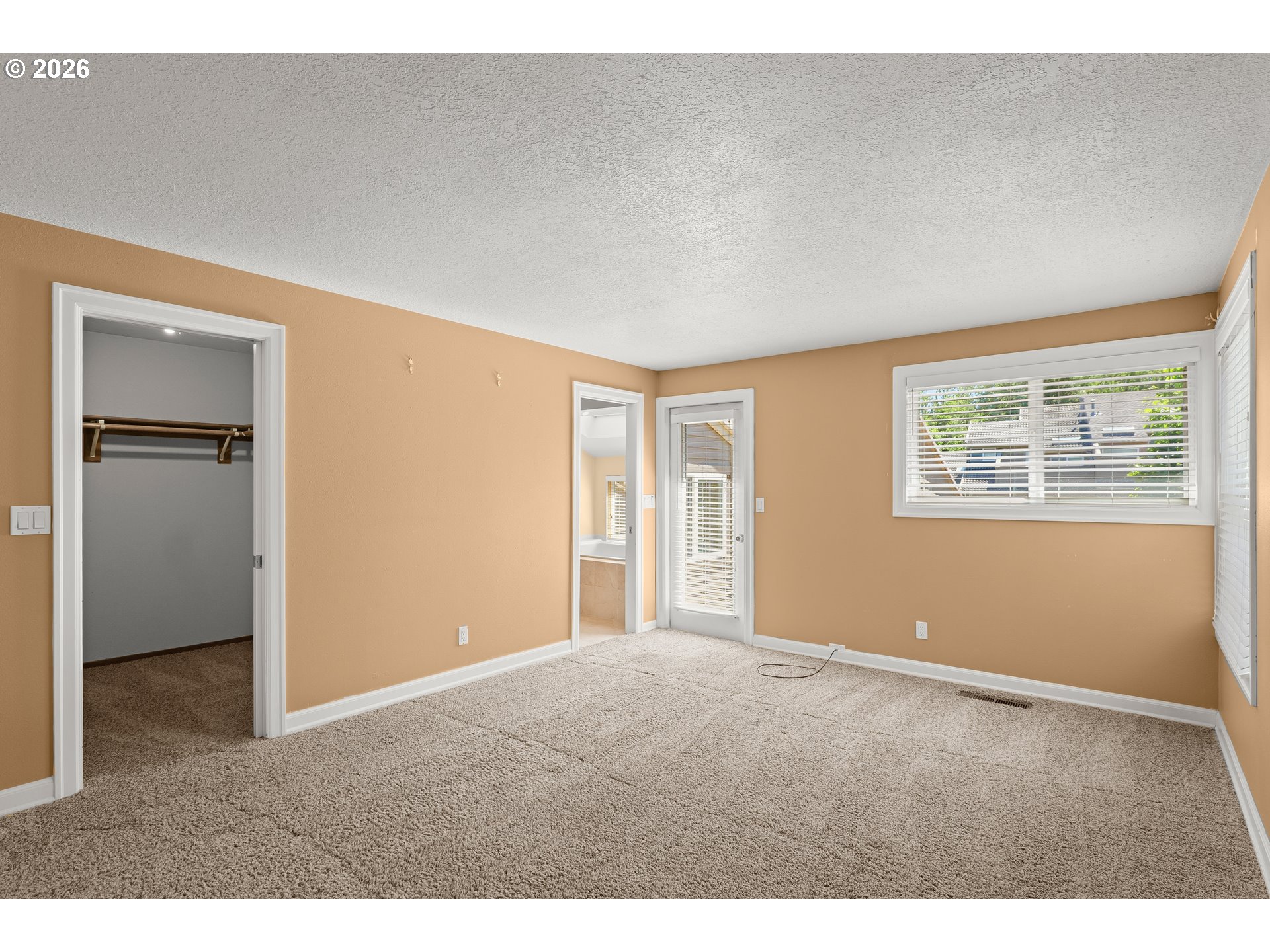 7859 Southwest Raintree Drive Beaverton, OR 97008 - Photo 16 of 24 Owner's Suite Bedroom
