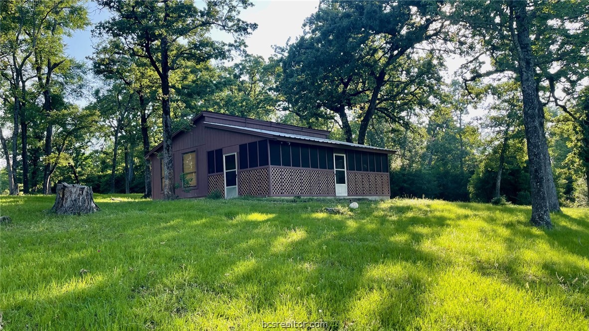 Tbd Tbd Wilson Pasture Road Bryan, TX 77808 - Photo 5 of 29 a view of a house with backyard and garden