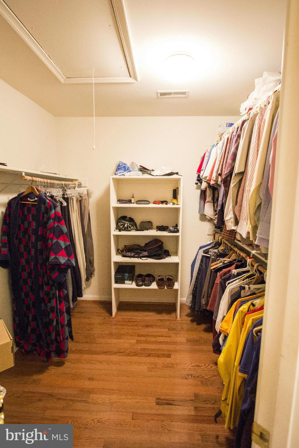 1827 Beulah Road Vienna, VA 22182 - Photo 17 of 30 a view of walk in closet with clothes and shoes