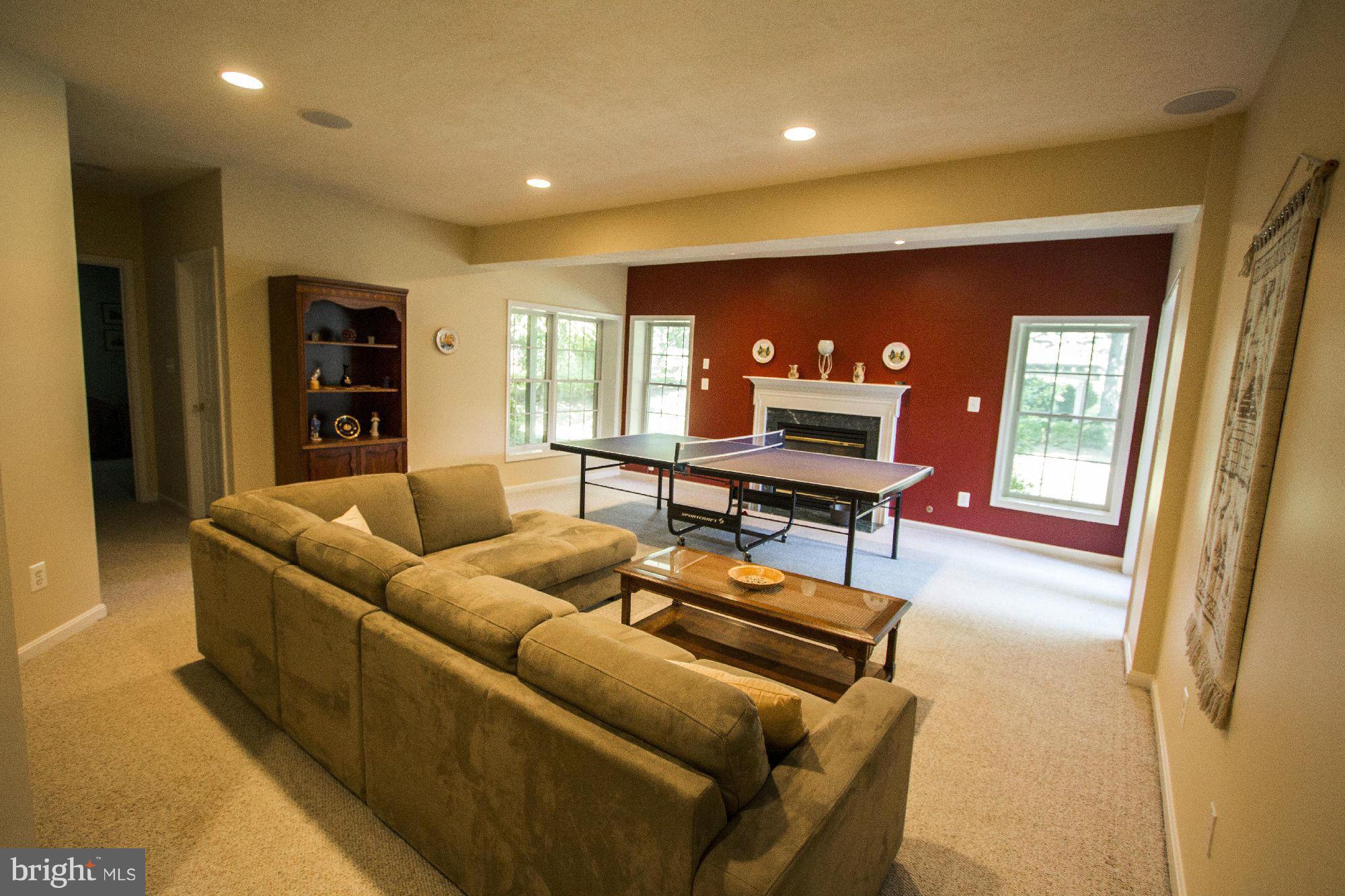 1827 Beulah Road Vienna, VA 22182 - Photo 23 of 30 a living room with furniture and a wooden floor