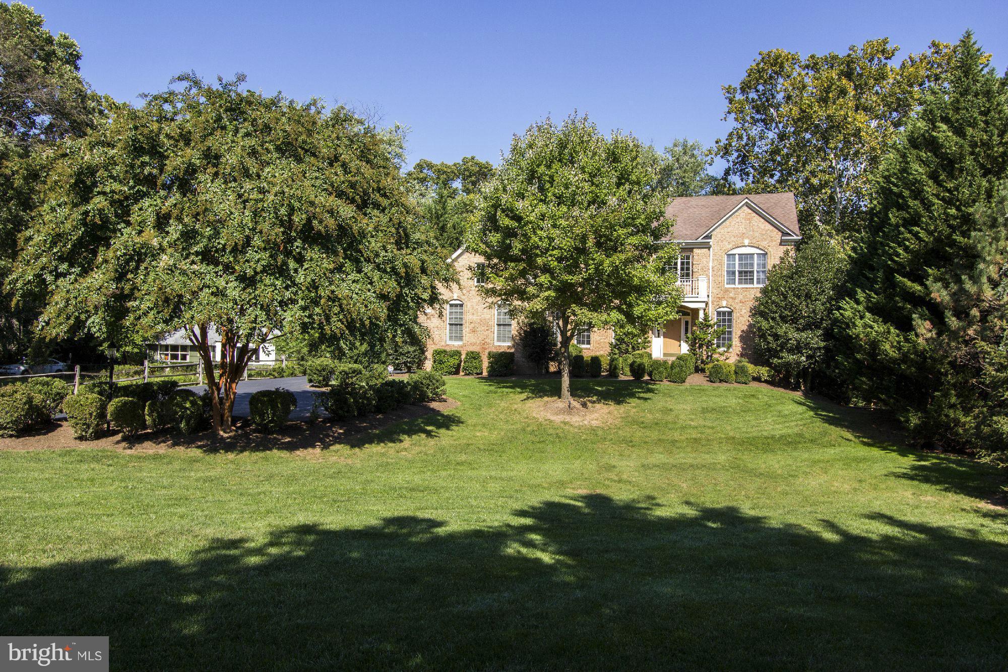 1827 Beulah Road Vienna, VA 22182 - Photo 30 of 30 a backyard of a house with a yard and outdoor seating