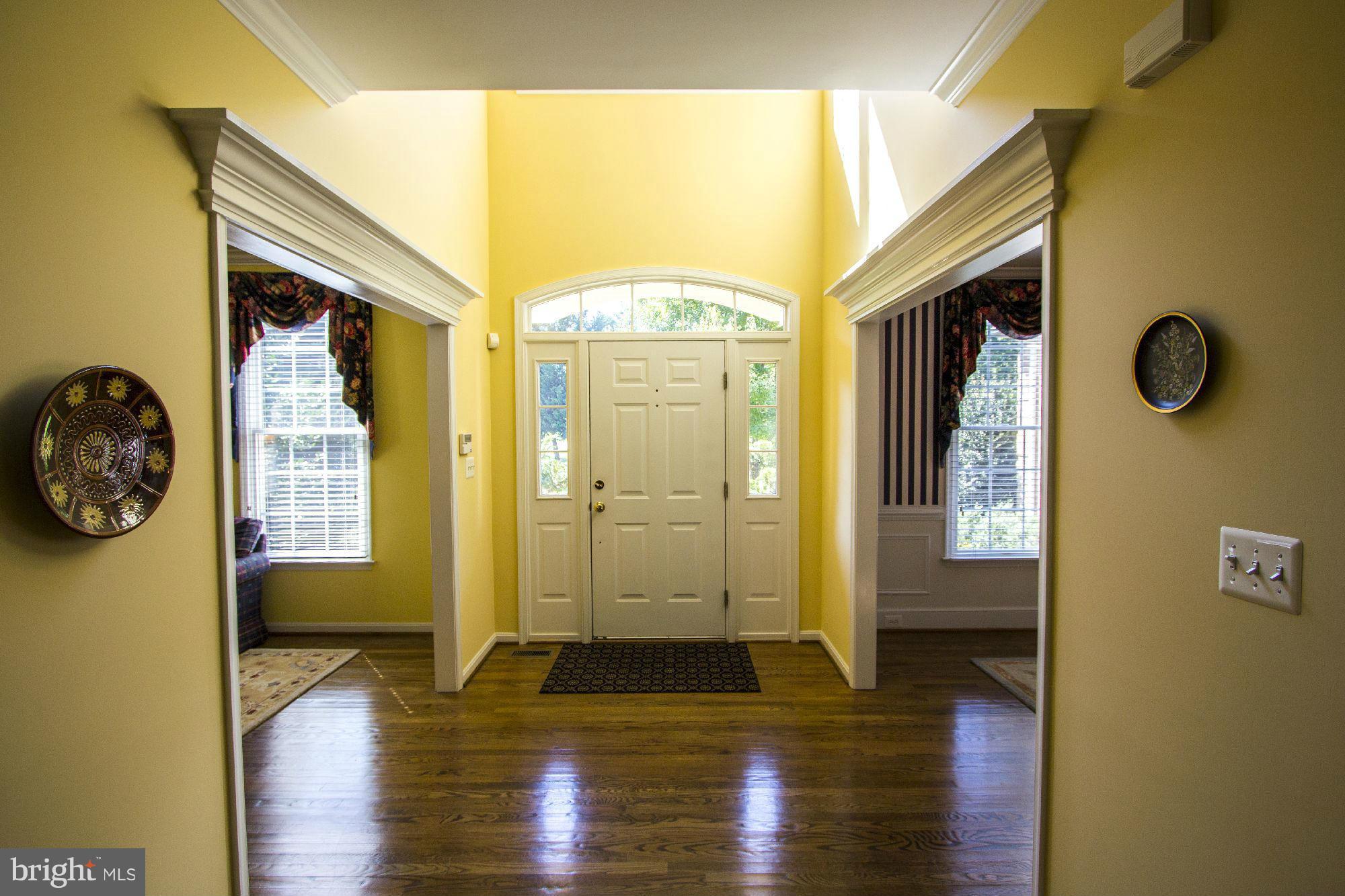 1827 Beulah Road Vienna, VA 22182 - Photo 4 of 30 a view of an entryway with wooden floor