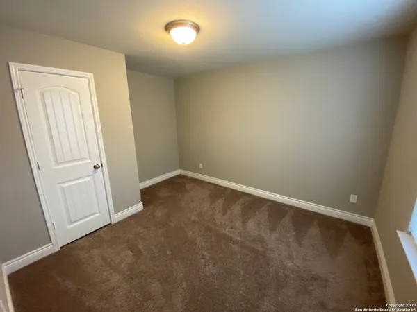 an empty room with a door