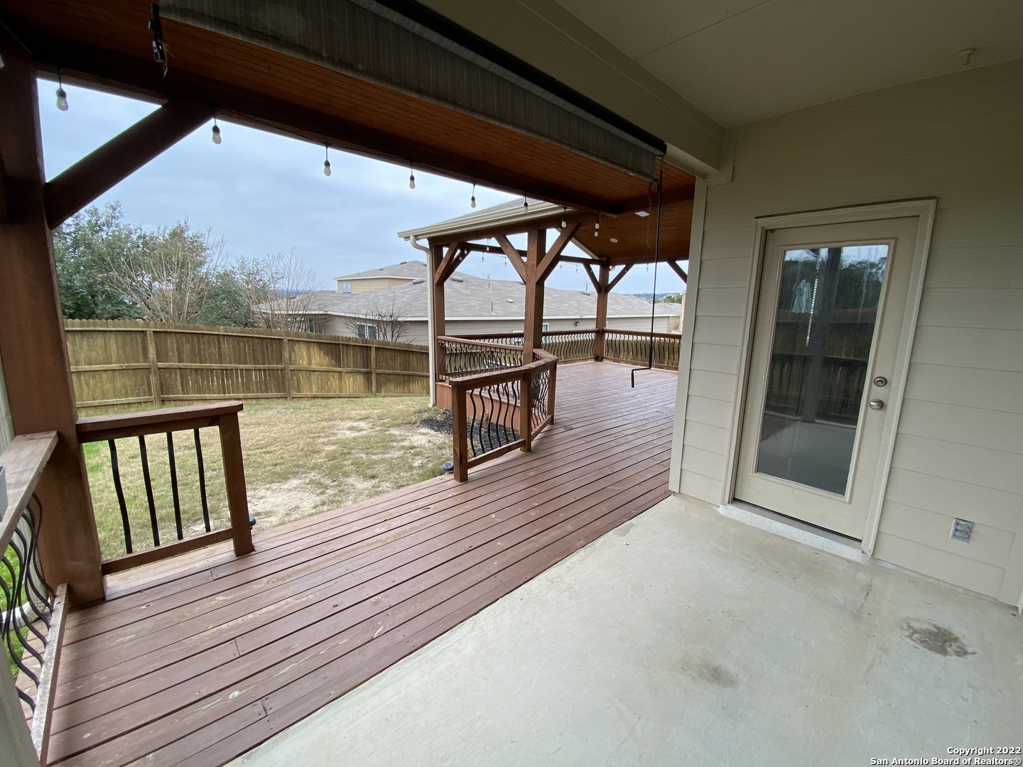 27447 Rio Circle Boerne, TX 78015 - Photo 17 of 18 a view of a balcony with wooden floor