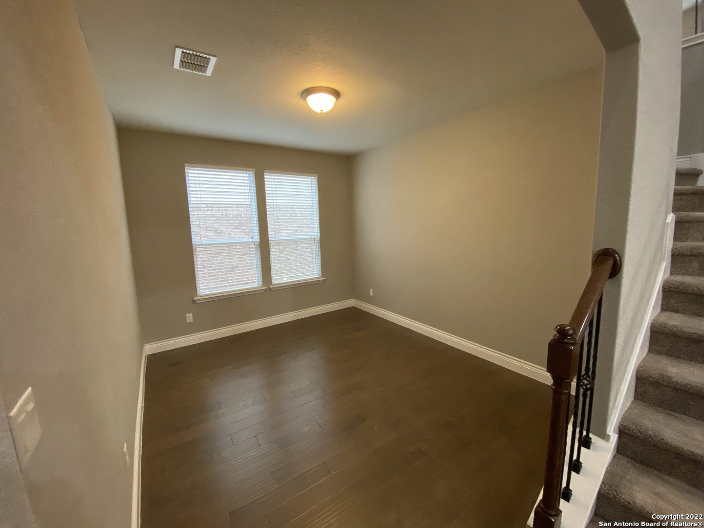 27447 Rio Circle Boerne, TX 78015 - Photo 6 of 18 a view of an empty room with a window