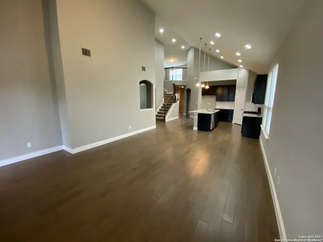 a view of a living room and dining room