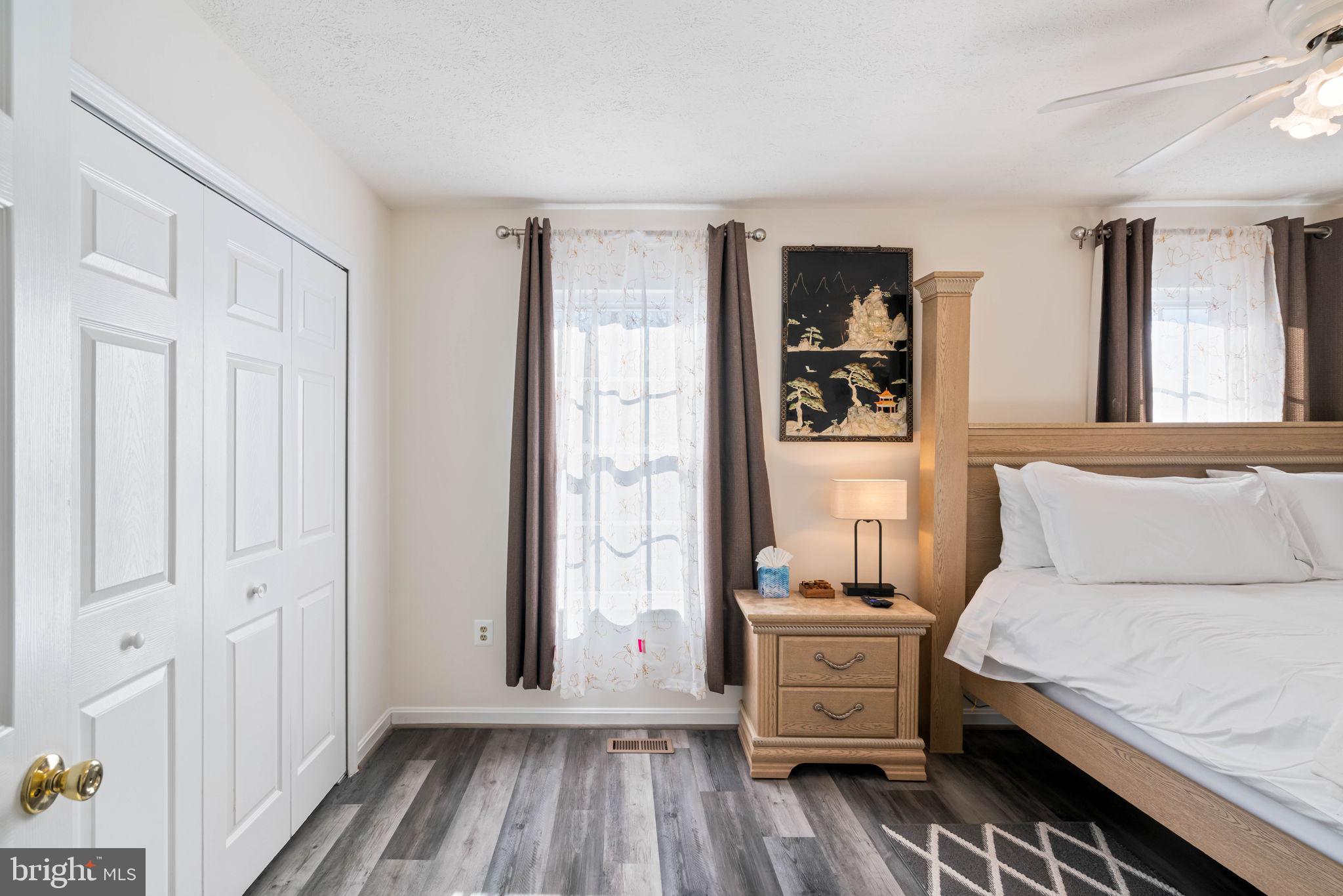 407 Kings Crest Drive Stafford, VA 22554 - Photo 15 of 42 a bedroom with a bed and a window