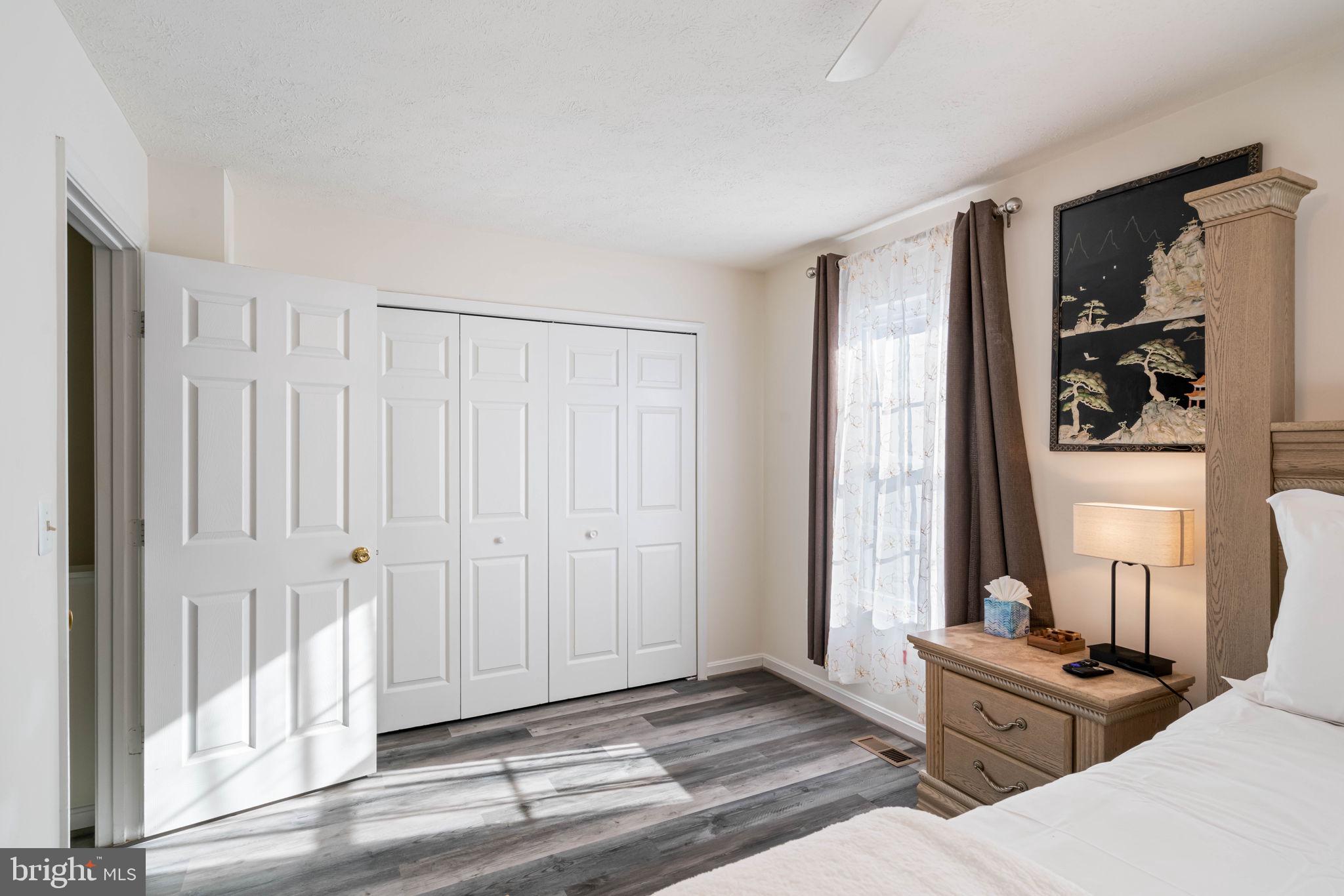 407 Kings Crest Drive Stafford, VA 22554 - Photo 16 of 42 a view of a livingroom with wooden floor and a window
