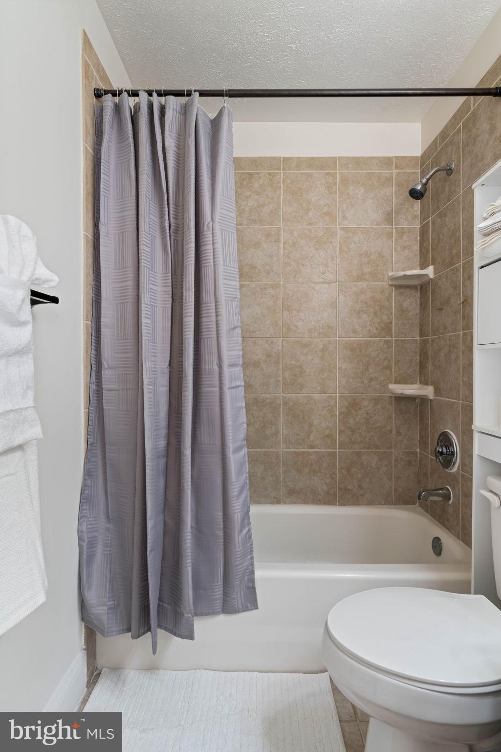 407 Kings Crest Drive Stafford, VA 22554 - Photo 18 of 42 a bathroom with a toilet and a shower